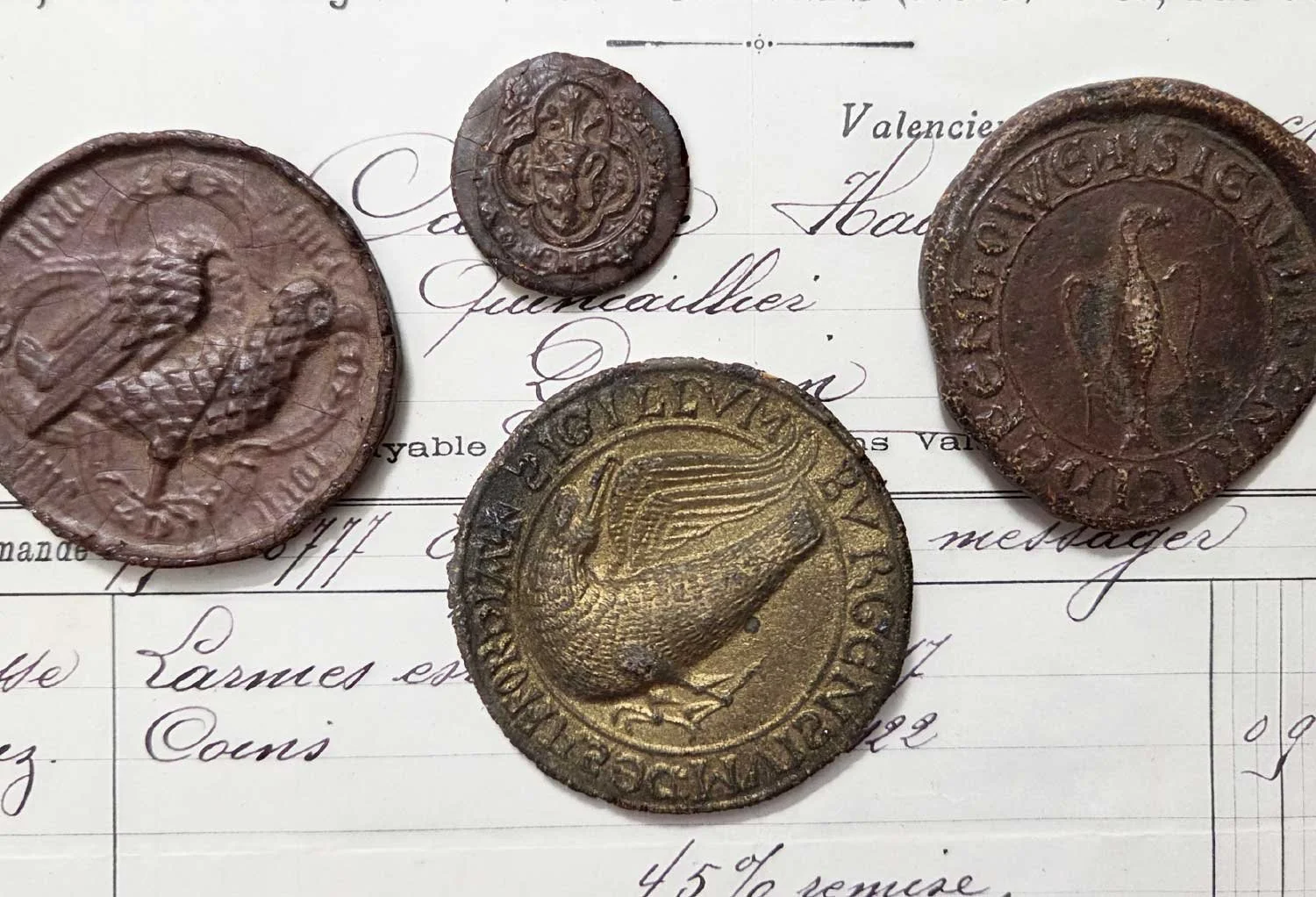 Lion Rampant and BIrd wax seals.
