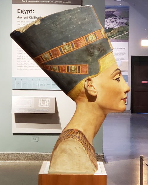 Bust of Queen Nefertitit, step-mother to King Tut. This is not he original but rather a  casting of the famous Nefertiti bust that can be found in the Neues Museum in Berlin. The original was excavated by the German Oriental Society in 1912.
The orig