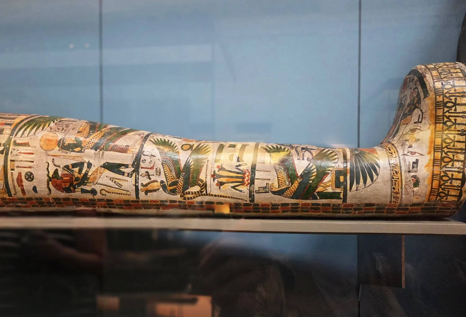 Detail of anthropoid wood Egyptian coffin.
