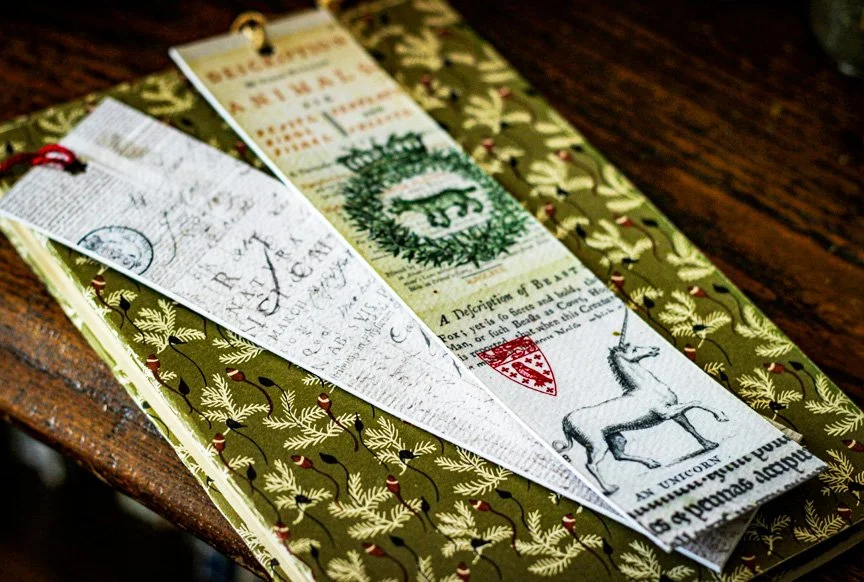 Back and front of DIY bookmarks.