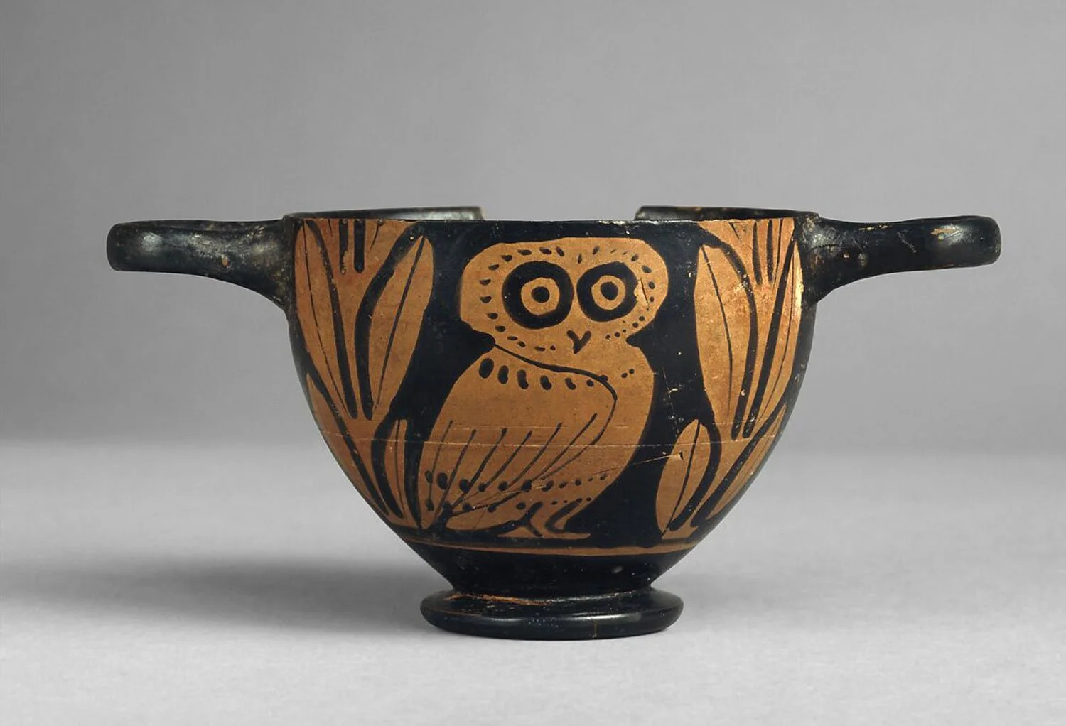 Owl skyphos (drinking cup).
