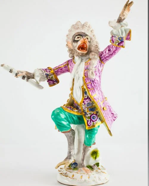From the German Meissen Porcelain Manufactory. The Conductor from the Monkey Band consisiting of numerous whimsical monkey characters as musicians and singers. There were two versions of the Monkey Band, a set of the first version was ordered by Mada