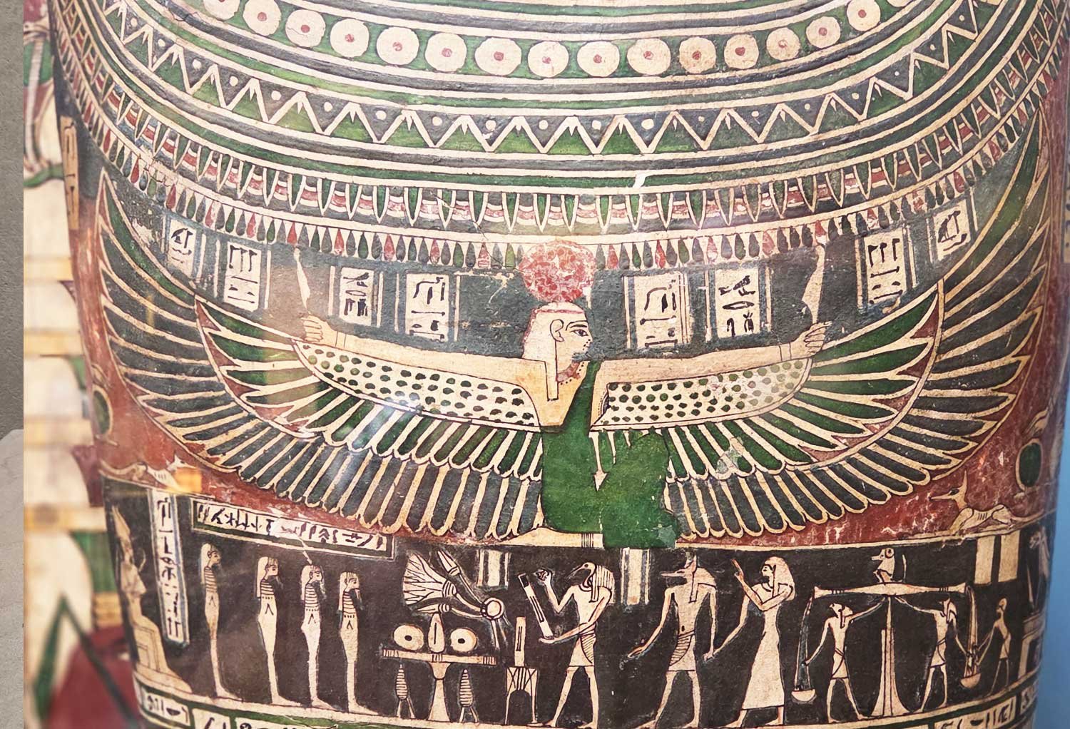 Goddess Nut holiding feathers.