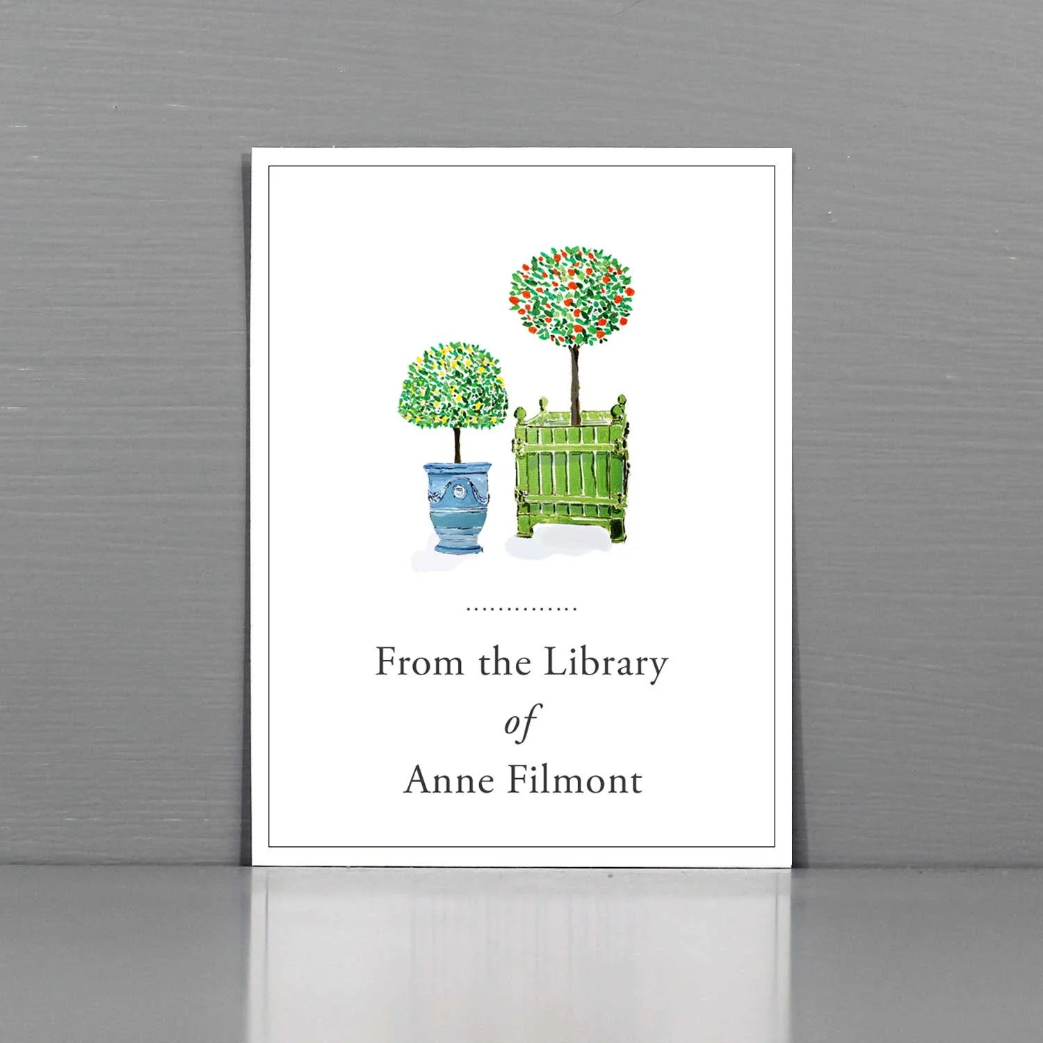 Bookplate with French Topiary Lemon and Orange Trees in classic planters.