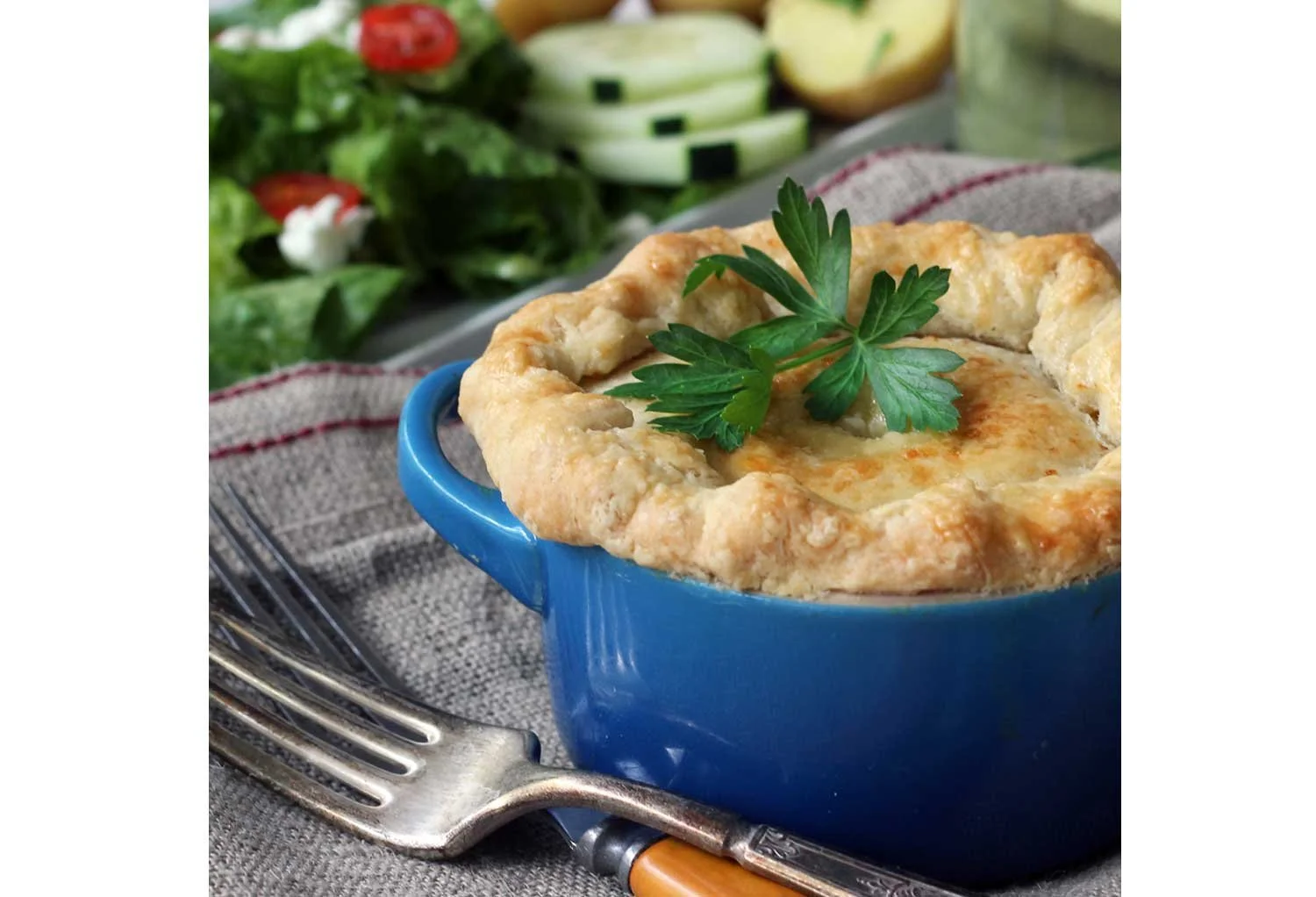 Savory pie made in a small crock.
