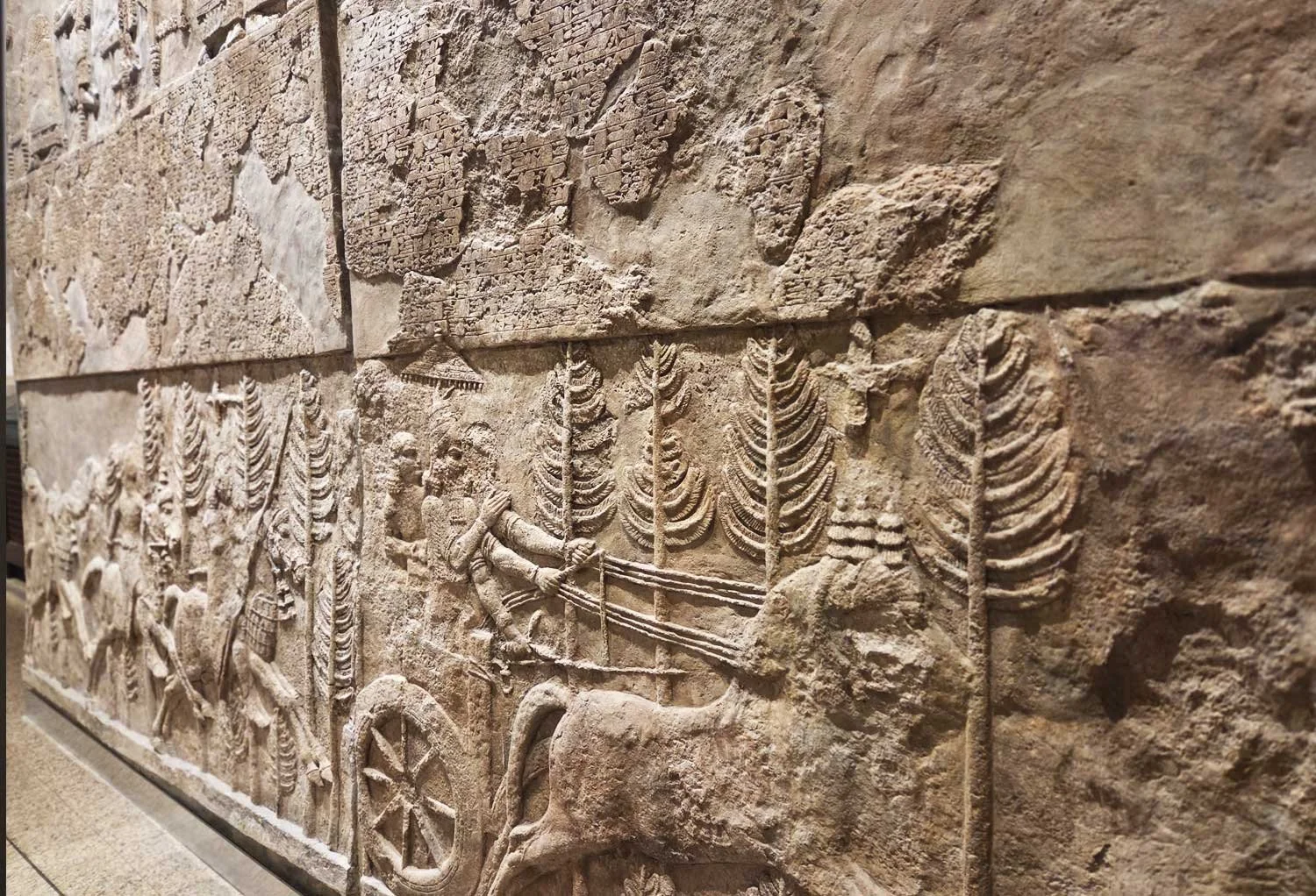 Wall relief ancient hunting scene.