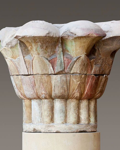 A composite capital with stylized papyrus and foxtail flatsedge design. This was one of ten columns that stood in of the temple of Amun at Hibis in Kharga Oasis. Late period, 380–343 B.C, Met Museum.
