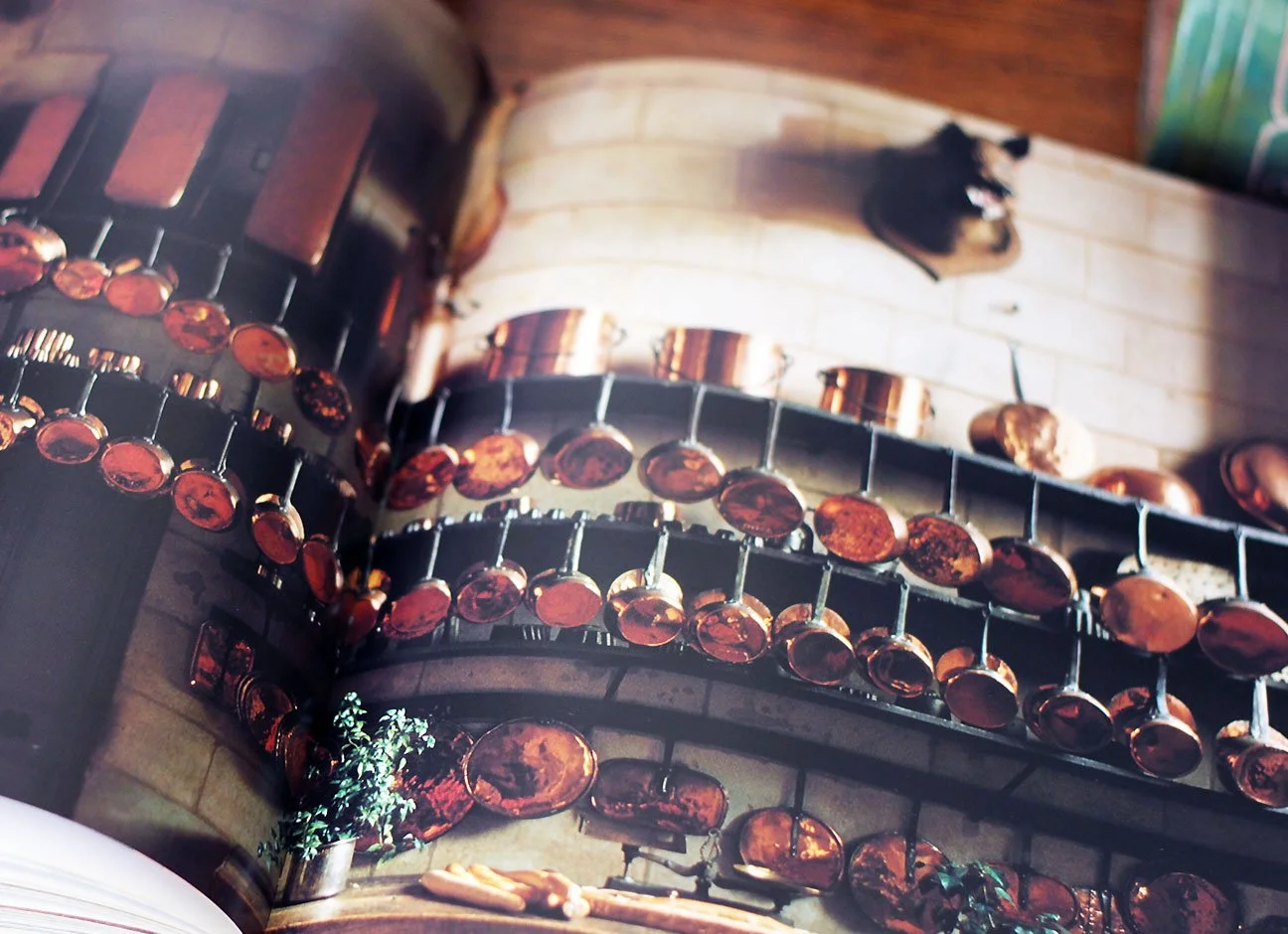 French kitchen full of copper pot.s