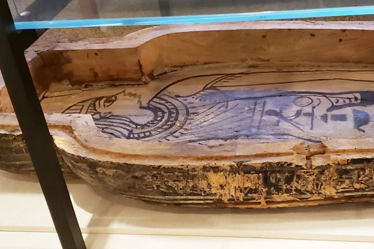 Interior of wooden Egyptian coffin with decoration. Institute for the Study of Ancient Cultures, University of Chicago campus.