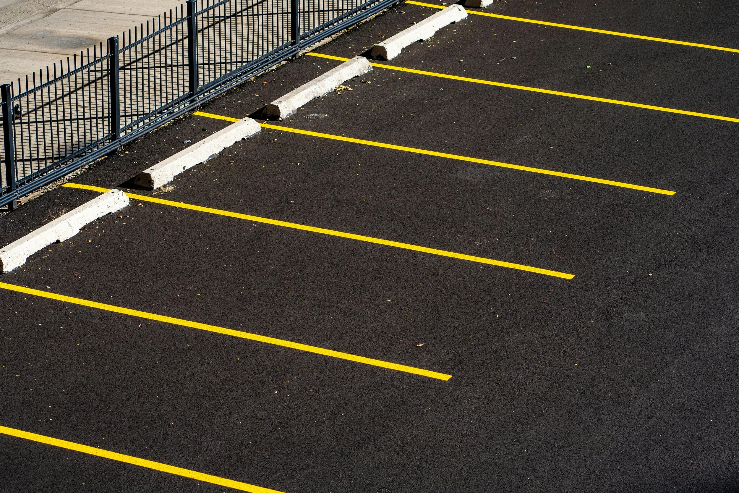 Regular Parking Lot Sweeping Protects Property and Costs | AAA Sweeping