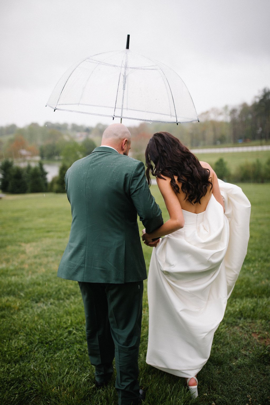 Bride under an umbrella.