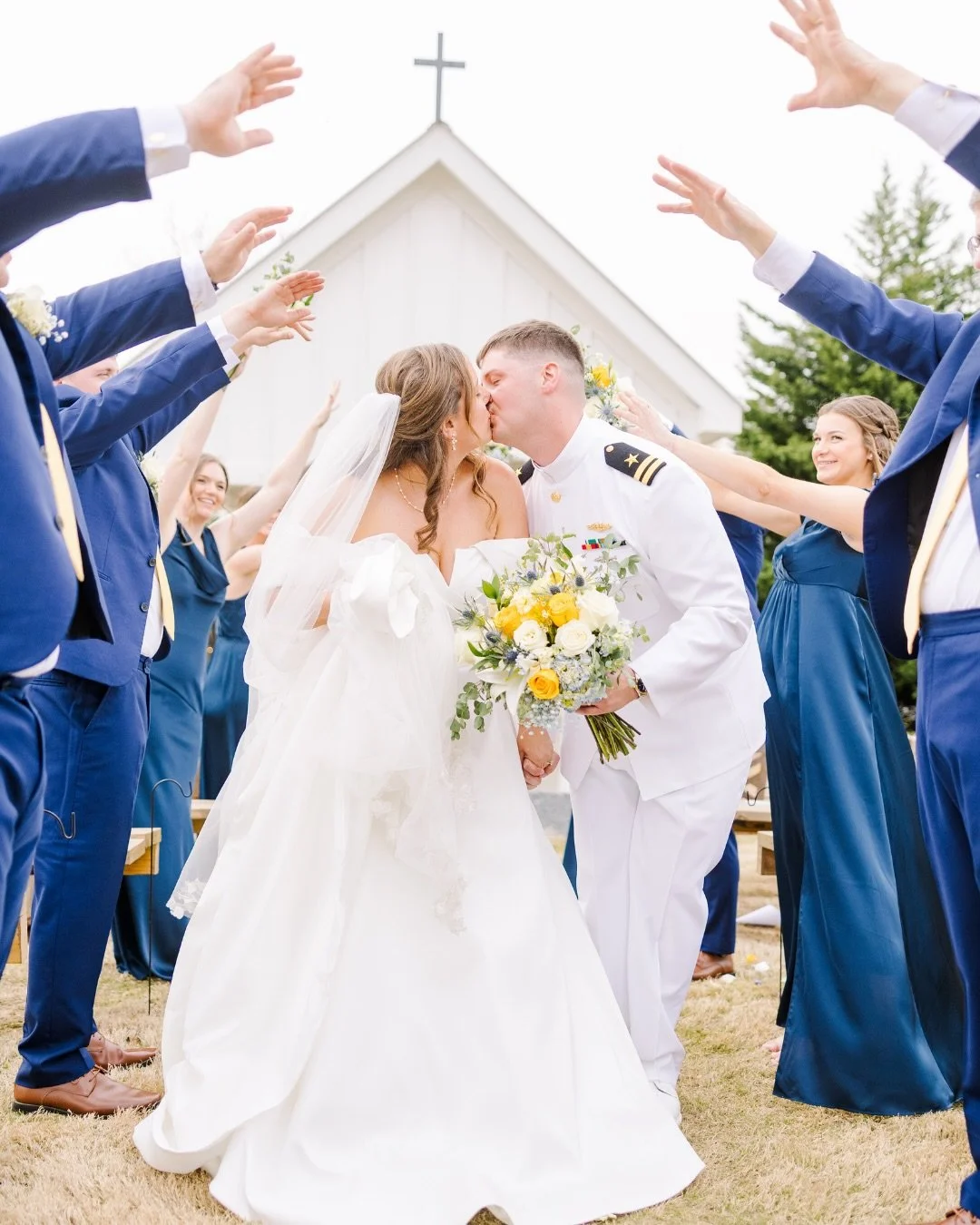 We recently hosted Lillian and Patrick for their gorgeous March wedding. It was a joy to help such a sweet couple plan their dream day! Their aisle exit was so fun as guests threw flower petals making for stunning photos. We wish them all the love an