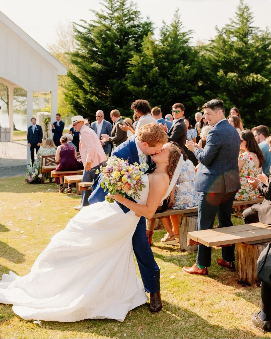 Mallory and Ryan&rsquo;s wedding last weekend was pure bliss! Their sneak peek photos are gorgeous and it was so fun to look through them. The floral arrangements were breathtaking and the colorful mix really made it stand out. Wishing them endless l