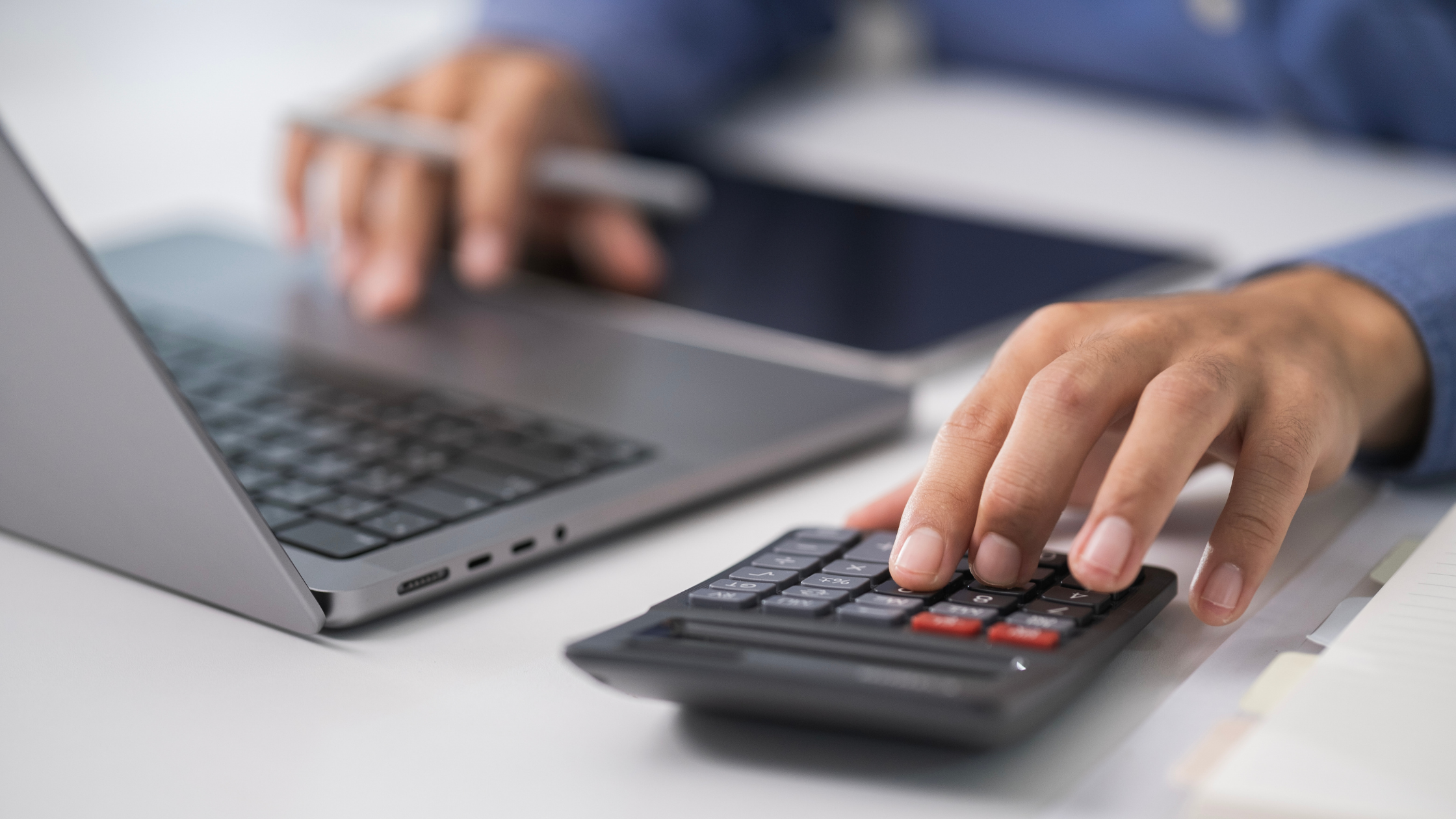 man with computer calculator