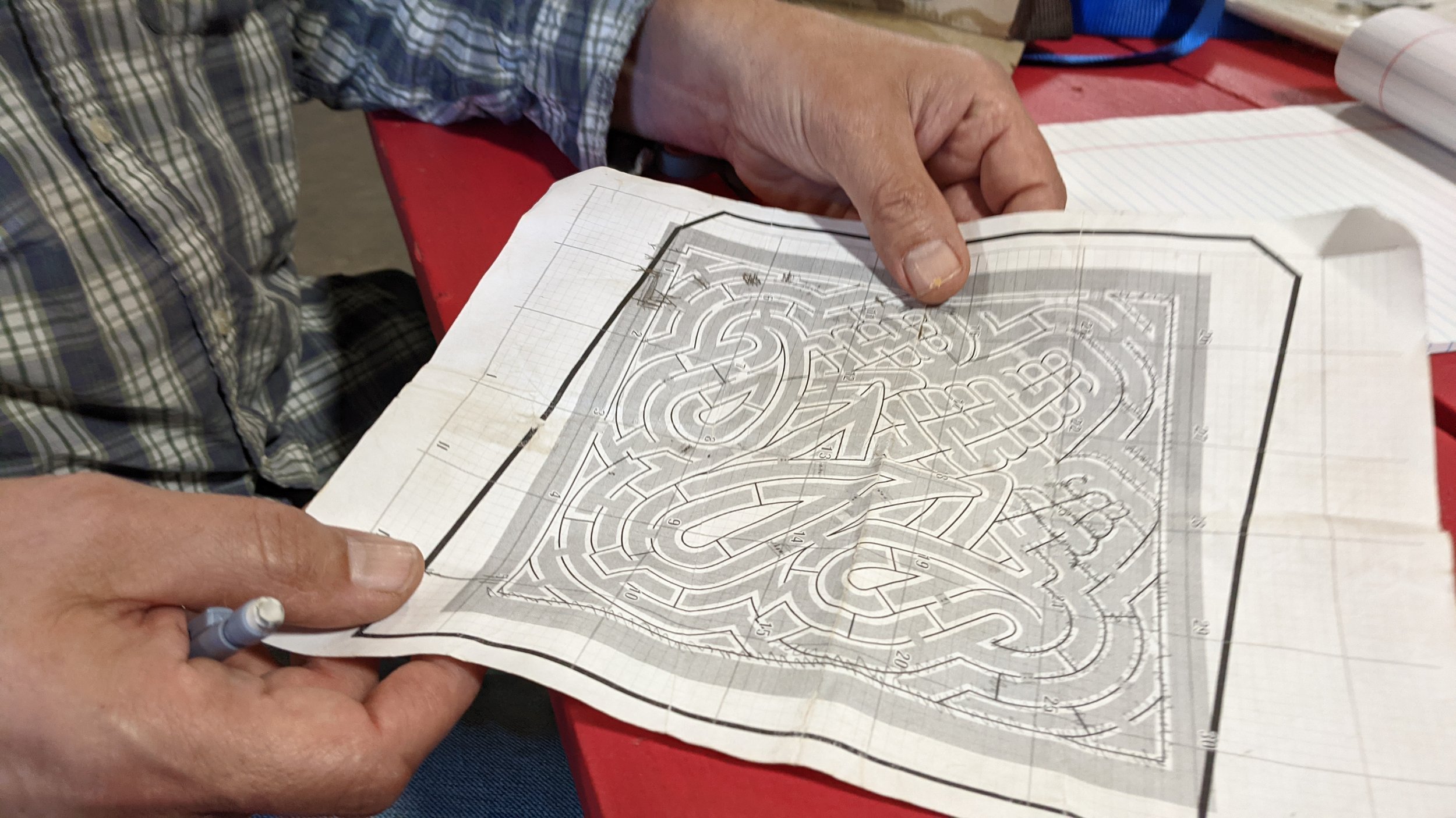  This year, Aaron Draplin crteated the design and then Peter translated it to graph paper, which was then drawn on the field. 