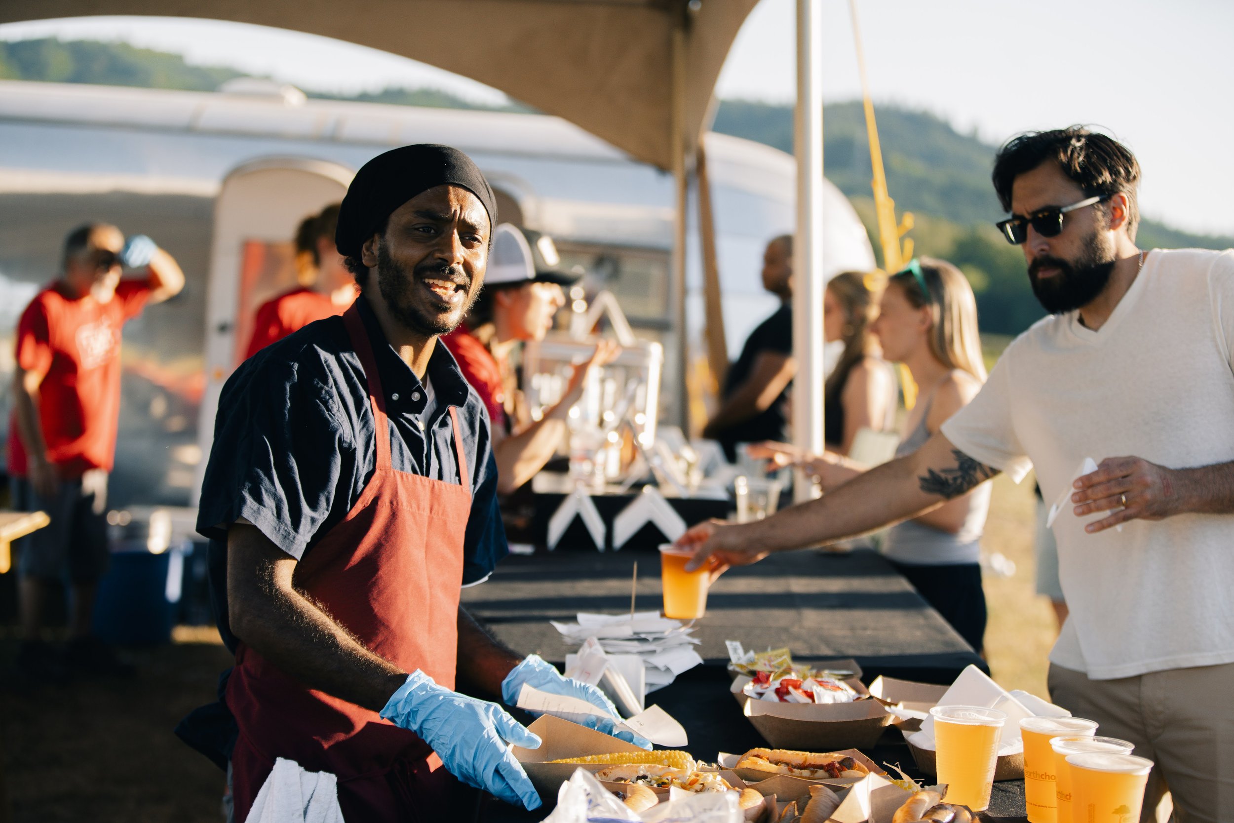  No hot dogs here! Chef Christian Ephrem made sure folks experienced food from the farm when they came to hear music. Burrata and arugula on grilled stone fruit, custom ground brats with beet sauerkraut, heirloom tomato salad with basil . . . and Far