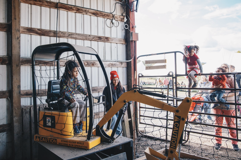 When kids come to the farm, they usual head right for the animals or the tractors. It was so fun this year to have an excavator they could operate.