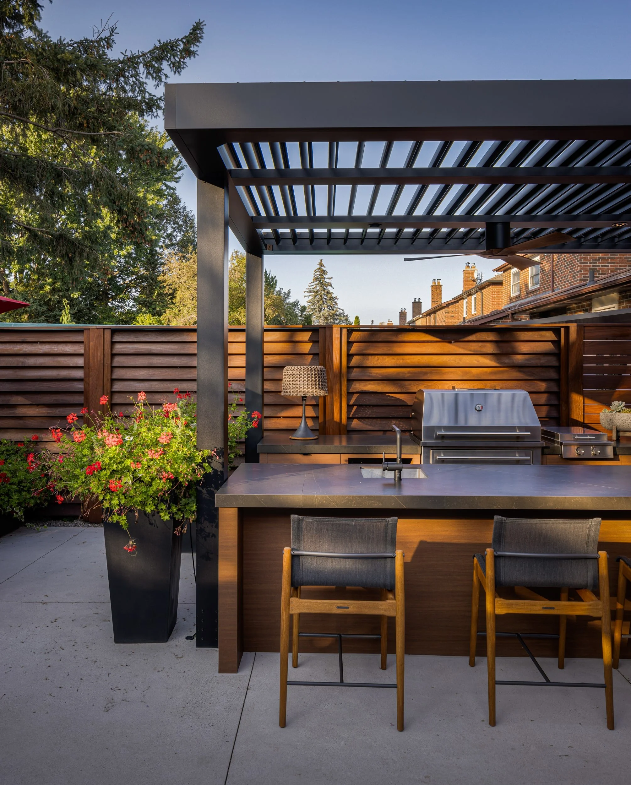 garden-living-outdoor-kitchen-aluminum-motorized-pergola-planters.jpg