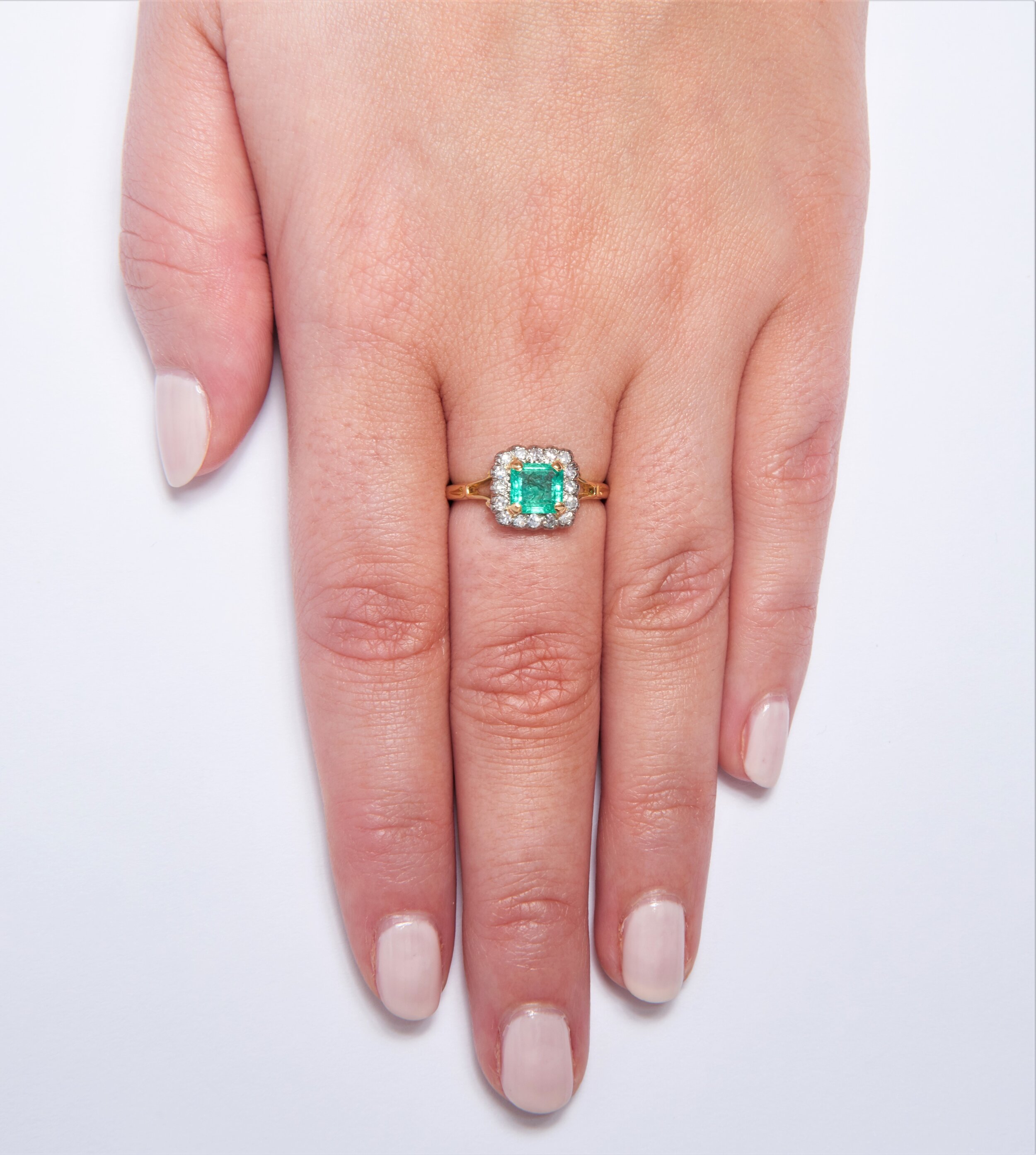 Edwardian 18KT and Platinum Carved Emerald and Diamond Halo Ring