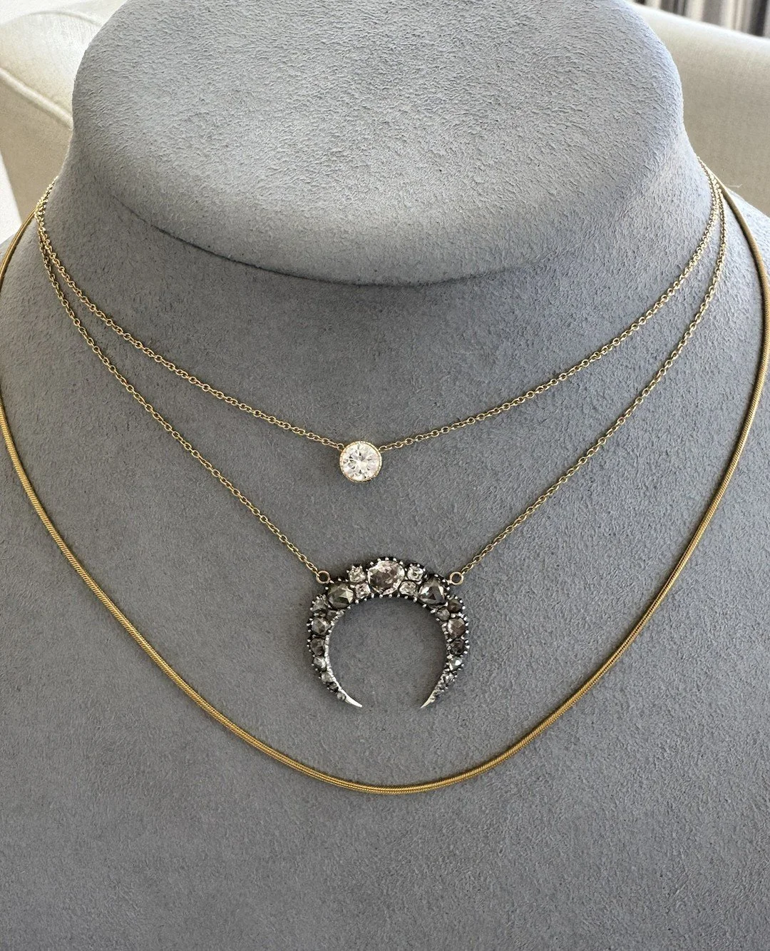Lovely layers for mom. Thoughtfully stacked, effortlessly elegant.⁠
⁠
How to Layer: Anchor &amp; Settle⁠
Start with a beautiful, but simple piece, let the eye draw to the focal point and anchor with a chain. We love a classic solitaire diamond, layer