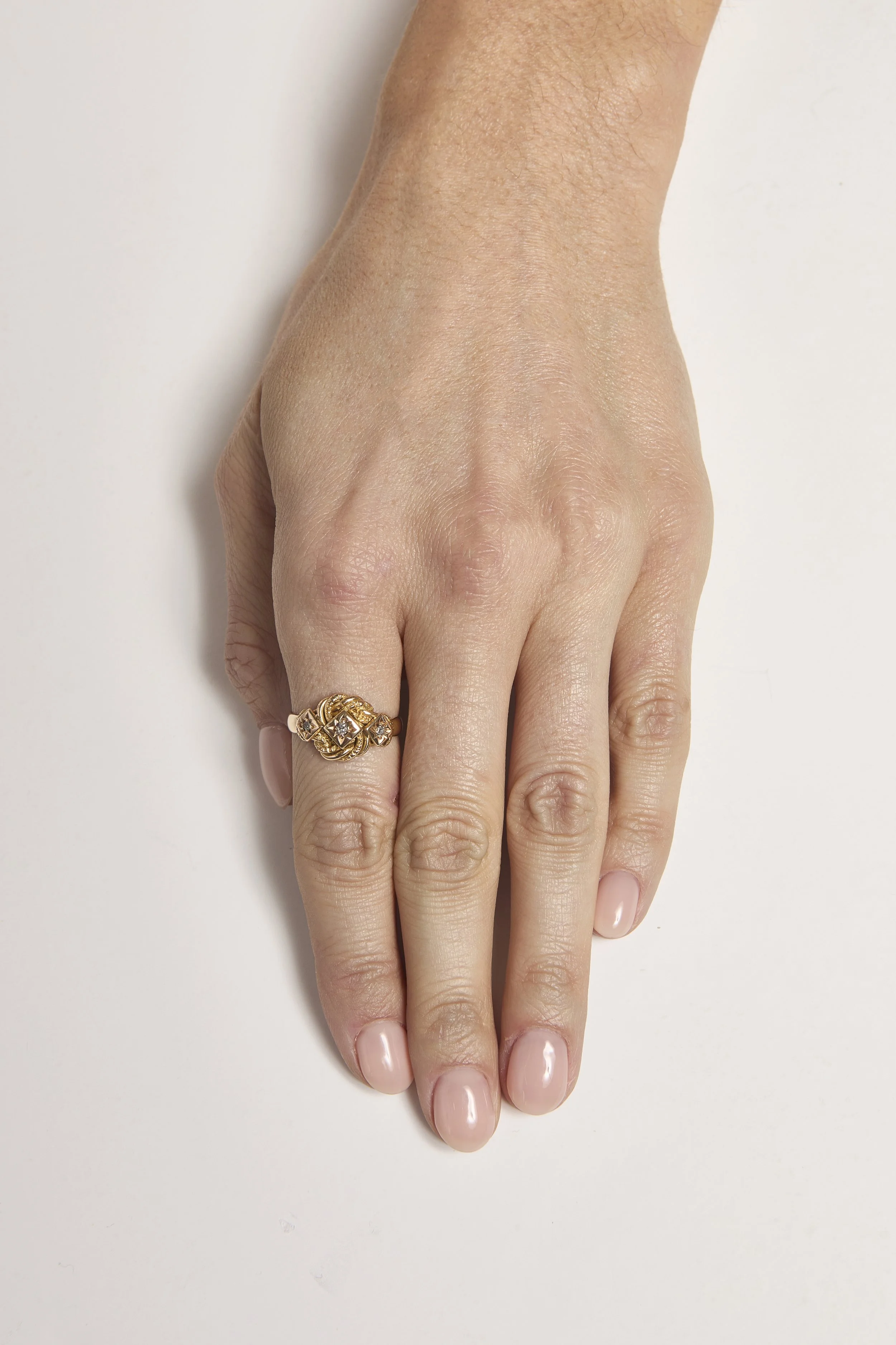 Knot and 3 Star Set Diamonds in Triangle Settings 0329.jpg