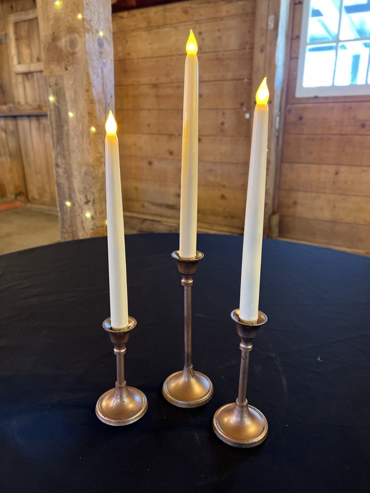 smooth-gold-tall-candle-sticks-all-three.jpg