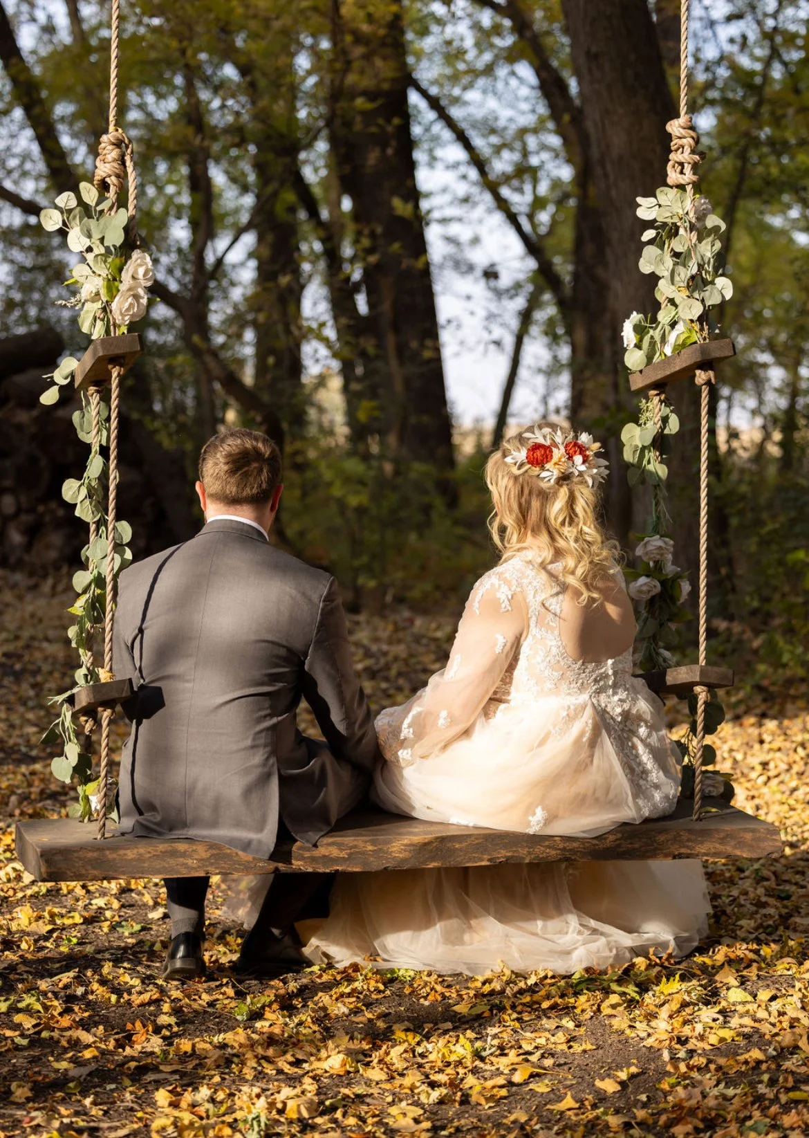 A couple at an outdoor wedding ceremony at JR’s Barn