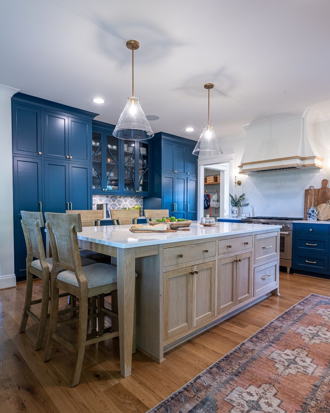 A kitchen designed for entertaining guests! The natural wood island feels inviting and the bold cabinets are sure to draw your guest&rsquo;s eye!

#kitchenrenovation #kitchendesign #birminghaminteriordesign #birminghaminteriordesigner #interiordesign