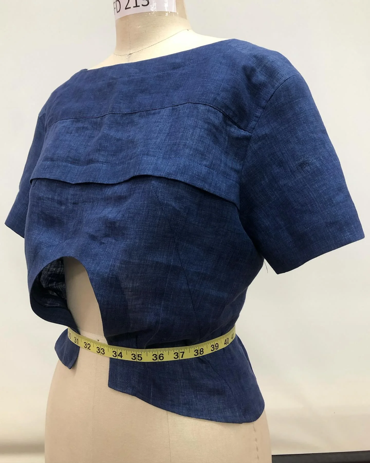 My up-cycled top design made from a very worn out indigo linen shirt of my mom&rsquo;s. In the second fashion design course at tmu we were tasked with creating an up-cycled garment inspired by a film, I chose Frida (2002) drawing on the themes of mat