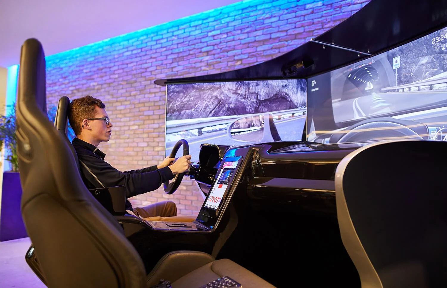 People engaging in a virtual reality simulation for Toyota Connected.