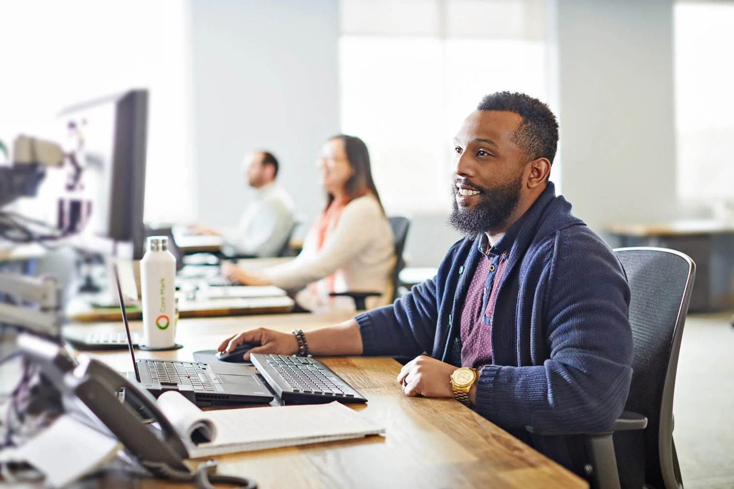 Professional corporate photography in Dallas capturing focused work environments.