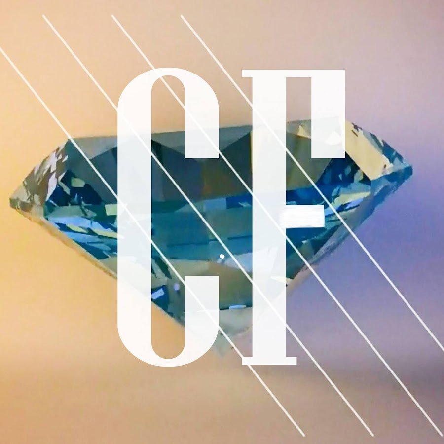 A close-up of a cut diamond with the word 'COOL' overlayed in large white letters and lines crossing diagonally.