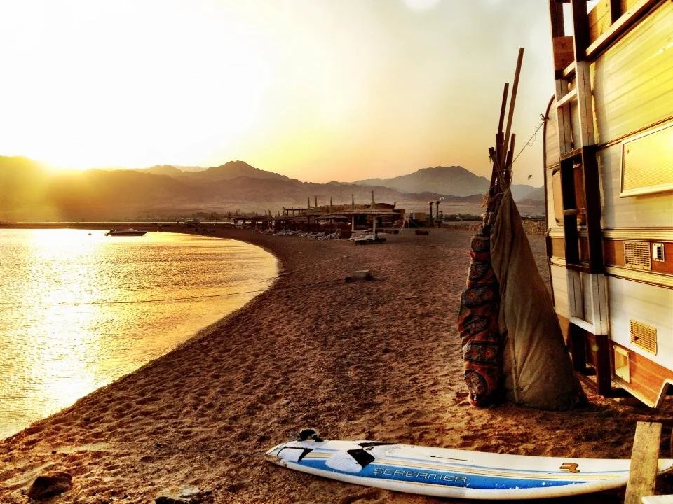 A caravan and surfboard - Laguna, Dahab at sunset