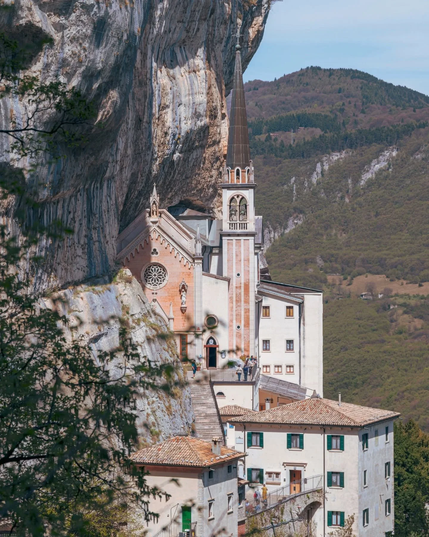 Hanging between heaven and earth.

The Santuario Madonna della Corona is such an unbelievable place. A church carved into the cliffs of Monte Baldo at 775 meters above sea level just below the village of Spiazzi. To reach the church from the valley y