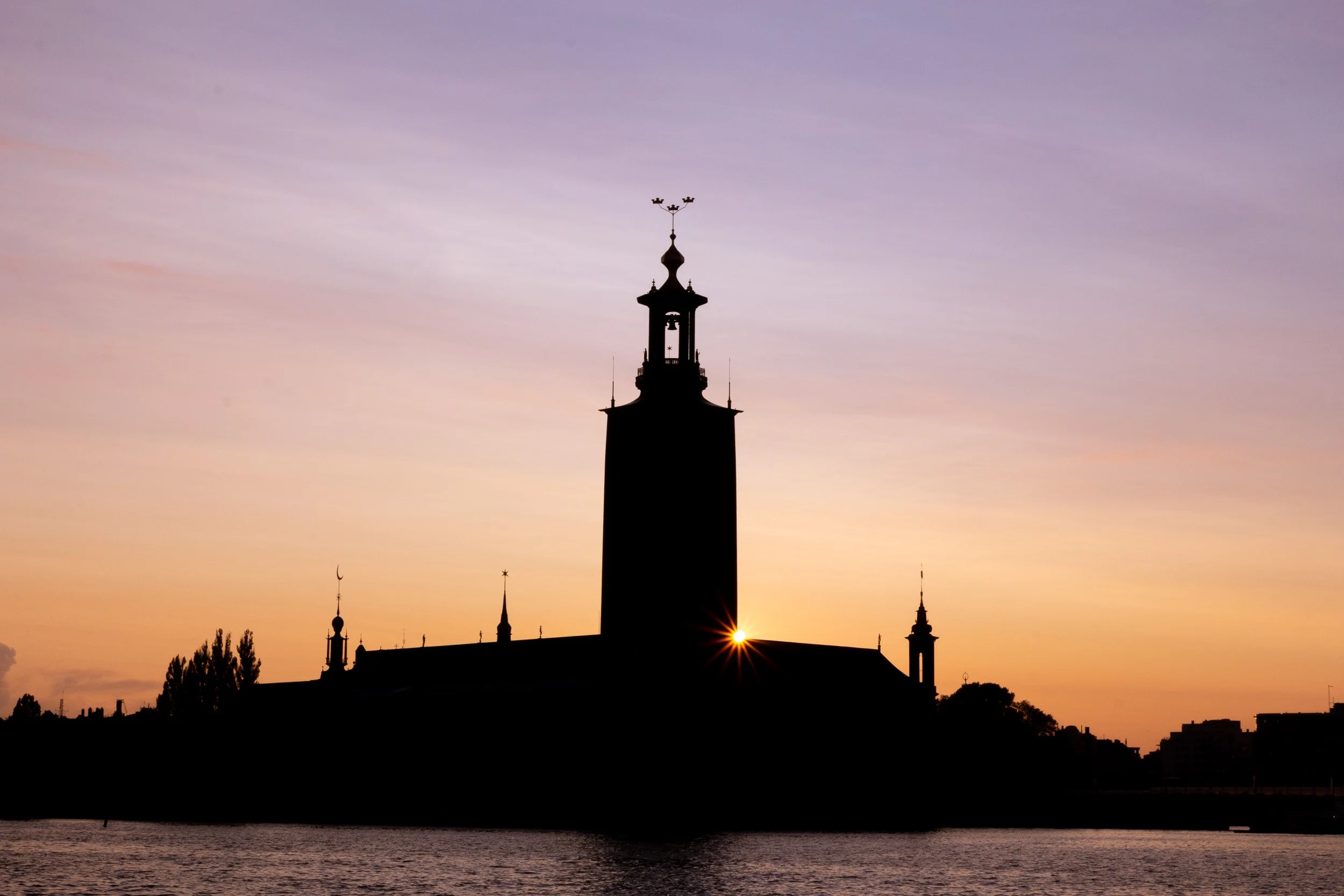 stockholm-city-hall-silhouette-summer-sunset.jpg