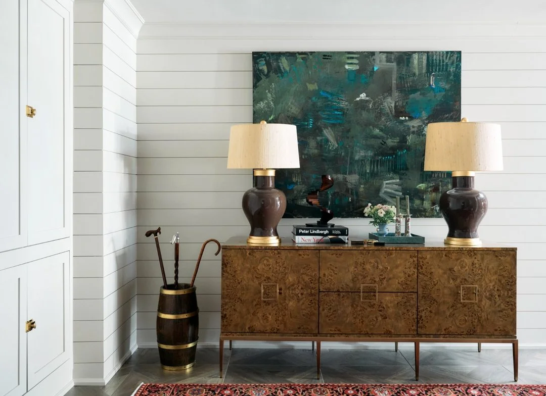 The perfect landing space at the bottom of the staircase in this client's newly revived basement. We love helping clients reimagine their already existing spaces!

#schillingandco #atlantainteriordesign #interiordesign #decor #homedesign #interior #i