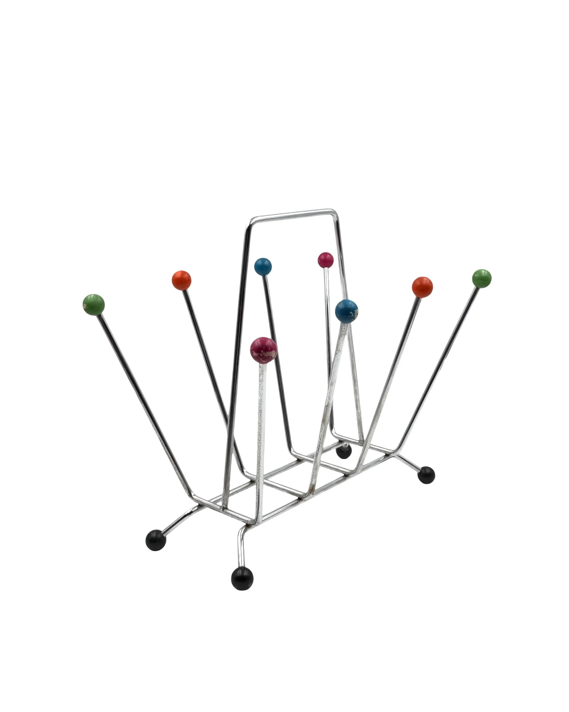 Vintage 1970s Italian Space Age magazine rack in the style of Eames, minimalist mid-century modern book holder, front view.