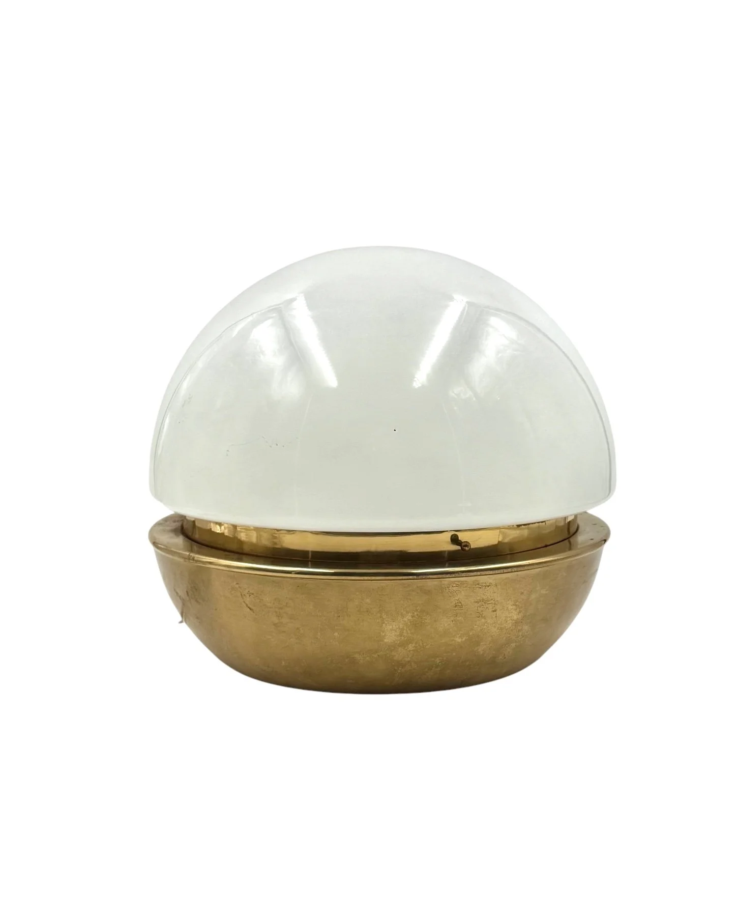 Vintage 1960s Italian table lamp with a polished brass dome shade and circular base, mid-century modern lighting design