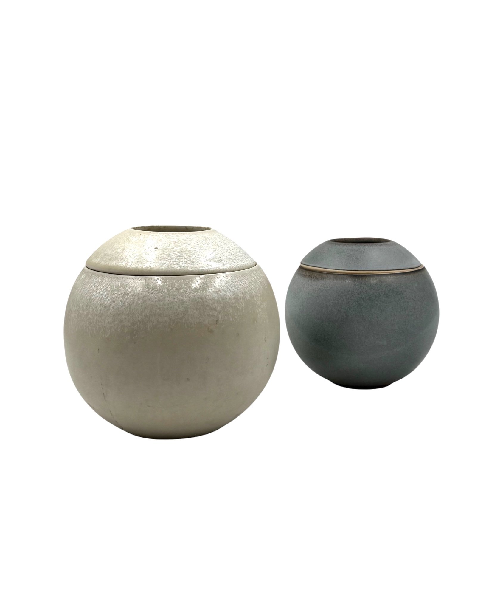 Pair of Mid-century Modern spherical gres ceramic vases by Franco Bucci, Italy circa 1970, with minimalist earth-toned textured glaze.