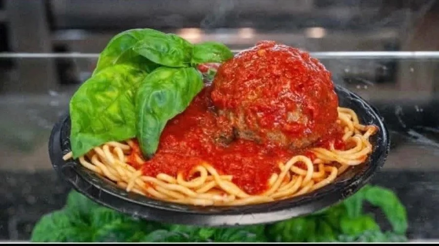Joey's family-recipe meatball over spaghetti in marinara