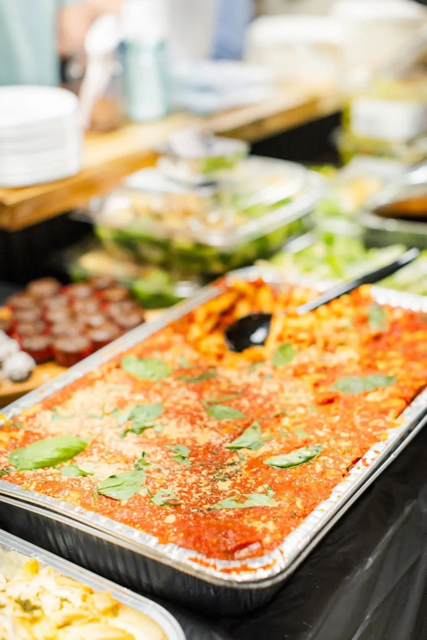 Tray of family-recipe pasta and Italian dishes for an event