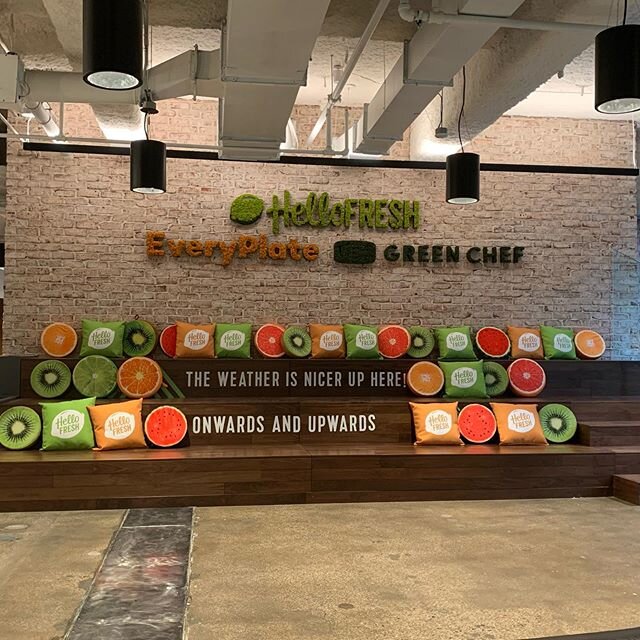 Our first #tbt! We had the pleasure of working for @gowithcd and @hellofresh hanging their logo in the lobby of their offices in #newyork. @gowithcd made this sign with moss so it&rsquo;s actually alive! That paired with all those fruit themed pillow