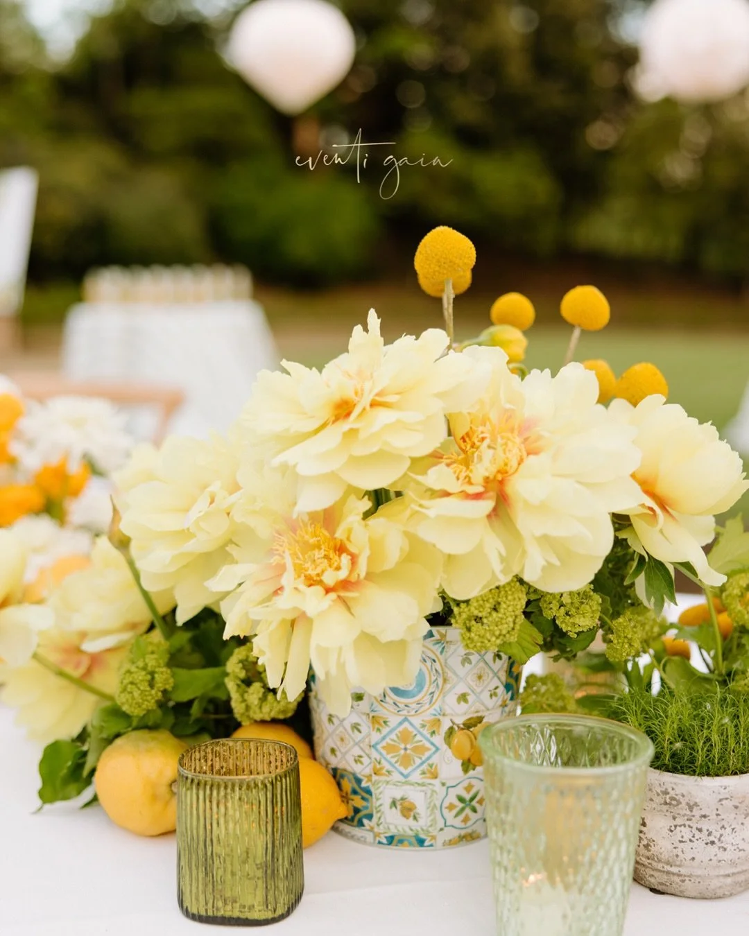 A celebration of Tuscan light and effortless elegance &mdash; this floral design draws inspiration from the warmth of the Italian countryside. 

A lively palette of butter yellow #peonies, golden #ranunculus, craspedia, and creamy white ranunculus mi