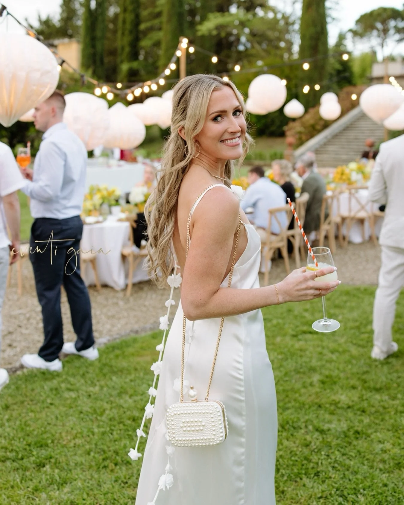 Satin, citrus, and the softest glow &mdash; Megan embodying modern bridal elegance, with a Limoncello Spritz that sparkles as brightly as she does. 🤍🍋
Spritz is always a good idea. 🍹✨

#eventigaia #brideelegance #tuscanwedding #weddinginitaly #exc