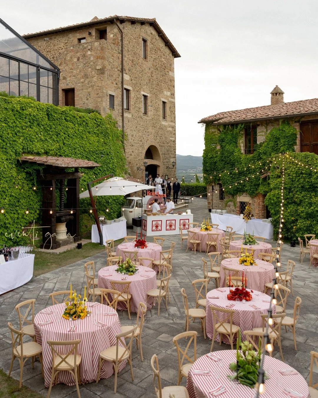 You bring the appetite, Tuscany brings the magic. 🍕✨

A courtyard transformed for a cozy pizza soir&eacute;e in Montalcino&mdash;rustic walls, glowing lights, and all the Italian soul.

#eventigaia #weddingplanner #tuscanwedding #weddinginmontalcino