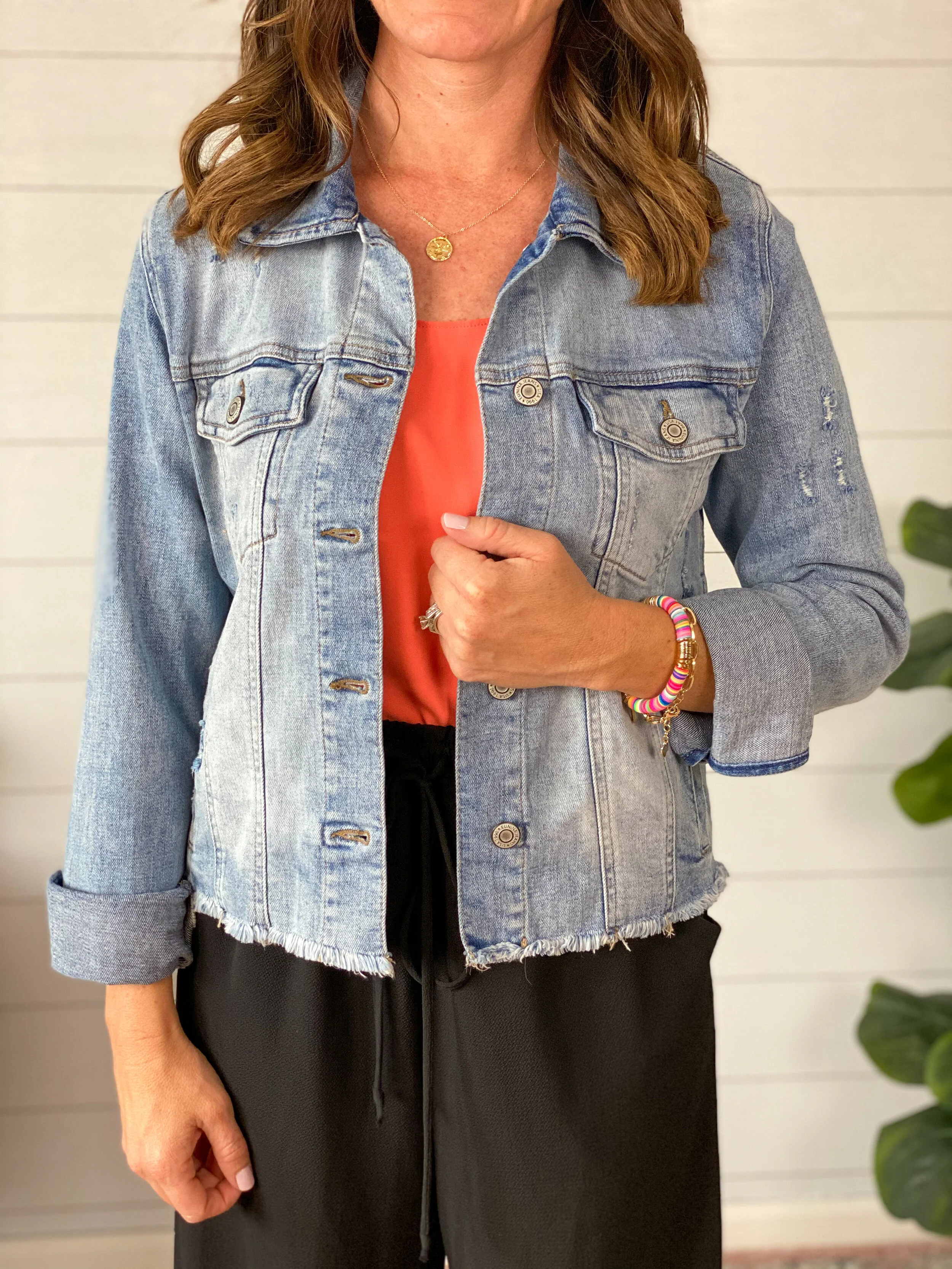 blue distressed denim jacket