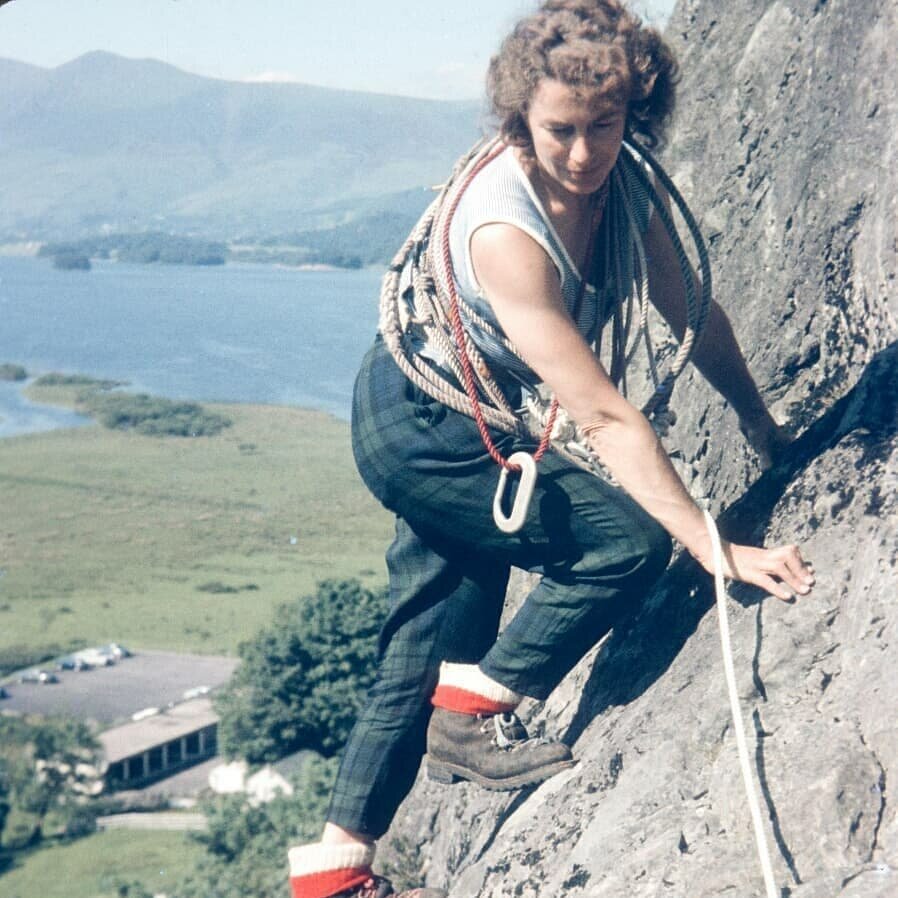 Gwen Moffat climbing in big boots on Shepherds Crag, Borrowdale, Cumbria