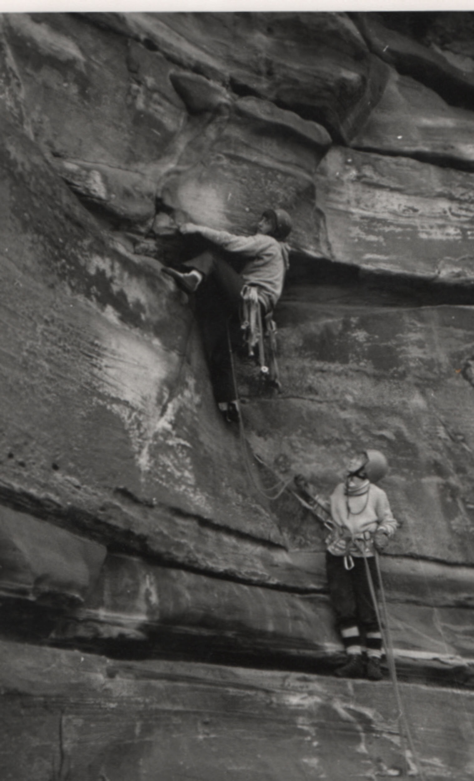 Shirley Angell and Joann Greenhow: a necky move on sandstone at St Bees Head, Cumbria in 1970