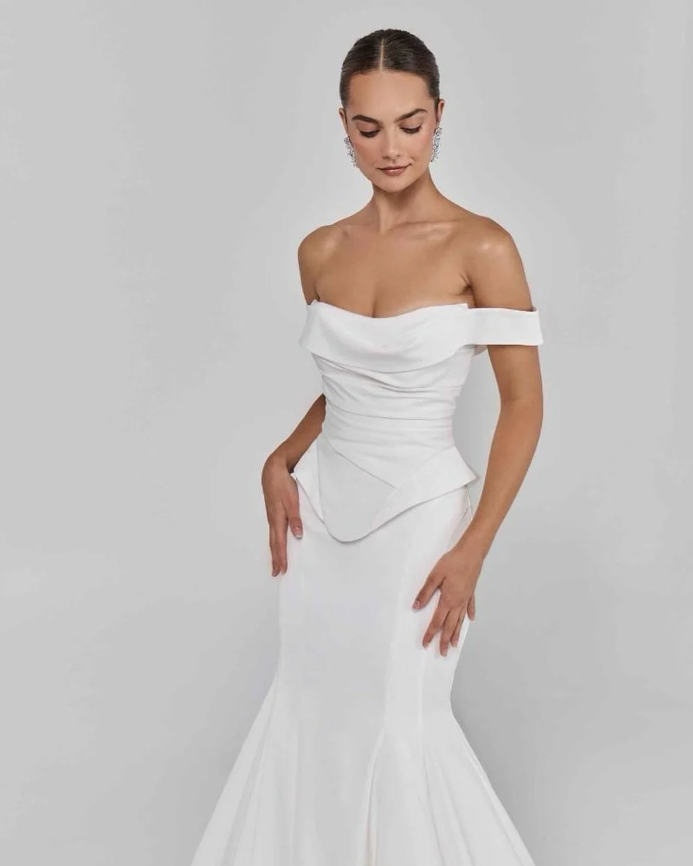 A fresh take on the off-the-shoulder mermaid. Sleek. Sculpted. So now. Blanc by Calla Blanche, only here for the trunk show until Sunday.

#ChantillyLaceBridal #AmherstburgBrides #WindsorEssexBride #DetroitBrides #MermaidGown BlancByCallaBlanche Trun