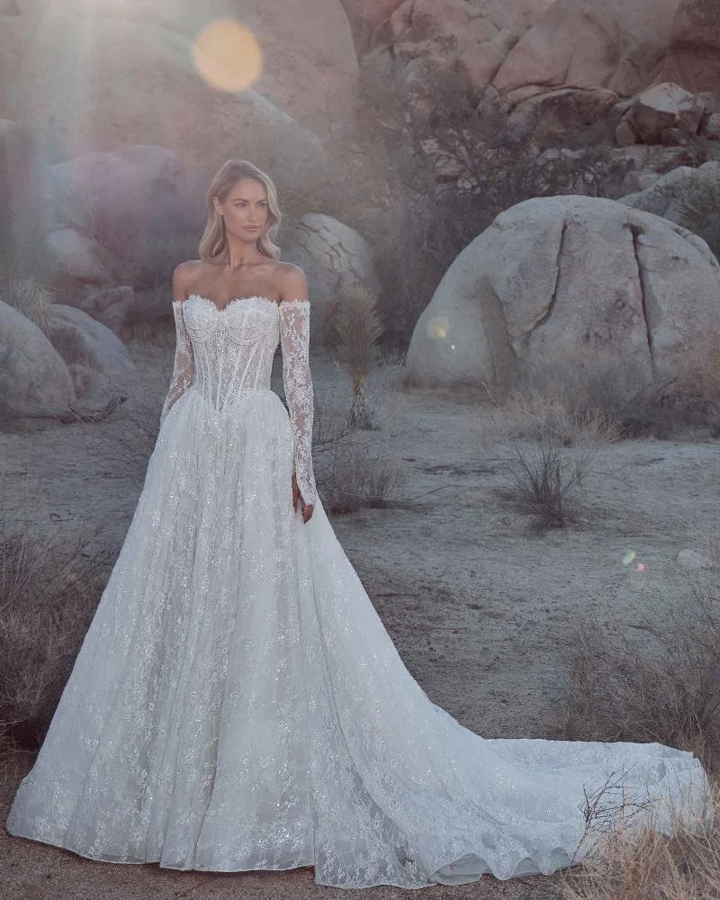 Bianca — Sparkly Basque Waist Wedding Dress with Long Sleeves or Strapless Neckline